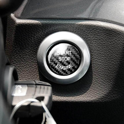 Carbon Fiber Engine Start Button Cover for BMW E Chassis in Black installed on dashboard protecting start/stop engine button