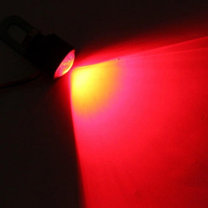 Eagle Eyes LED Strobe Lights for Motorcycles, 2-Pack with 90cm Wire glowing red beam from one metal strobe light showing visibility on road surface
