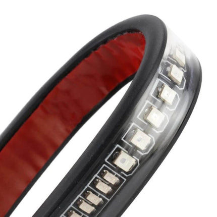 Red and Yellow LED Brake Lights for Motorcycle Safety - close-up flexible LED strip with red reflector and low-power brake indicators