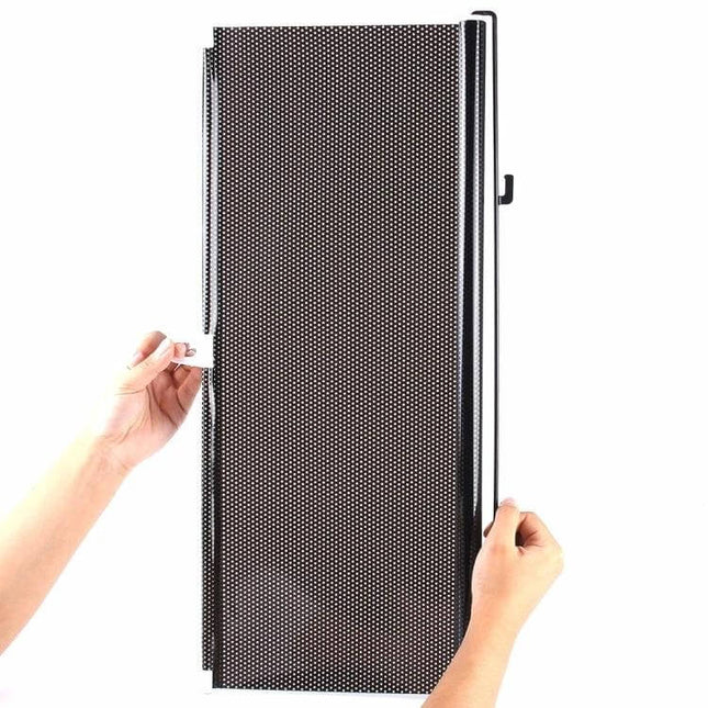 Foldable Black Car Insulation Curtain for Heat Protection, 125x58cm shown folded with hands holding it to block sunlight