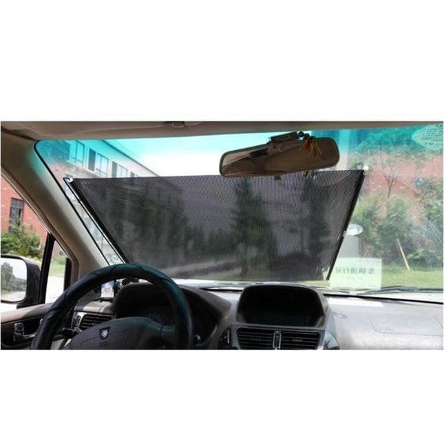 Foldable Car Insulation Curtain with Heat Protection, 125 x 50cm installed on windshield to block heat and UV while parked