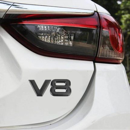 V8 Separate Shape Metal Decorative Sticker for Car Bodies - black metal V8 badge on white car near taillight, compact durable automotive accent