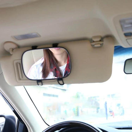 3R Portable Car Sunshade Mirror for Makeup Application clipped to sunshade showing woman applying touch-up in car