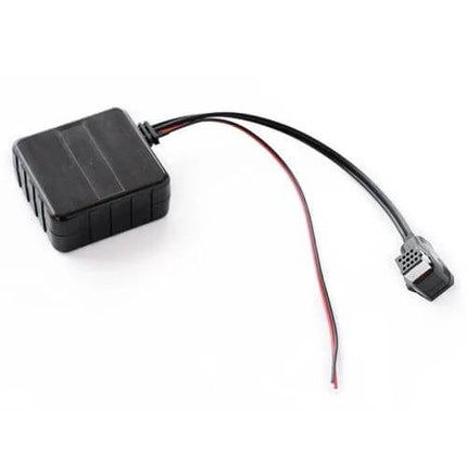 Car Wireless Bluetooth Audio Adapter for CD Changer to Stream Music - compact black module with CD changer plug and wiring harness