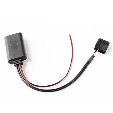 Car Wireless Bluetooth Audio Adapter for Ford Focus, Fiesta, Mondeo plugged into CD changer port with wiring harness for seamless factory stereo integration