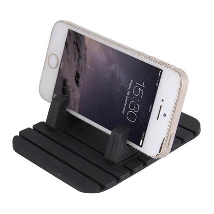Practical Car Dashboard Holder for Phones and Tablets in Black shown holding a smartphone on a vehicle dashboard