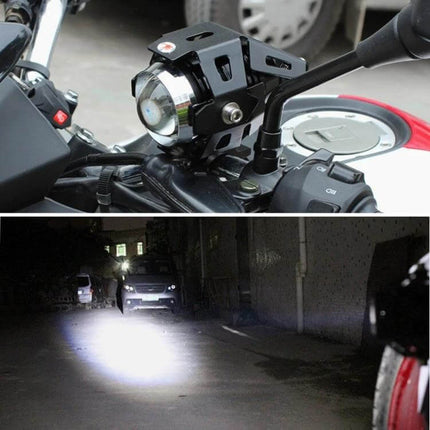 White LED External Headlight Lamp for Motorcycle Visibility mounted on motorcycle handlebar illuminating road at night
