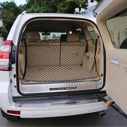 Universal Fit Mesh Cargo Storage Organizer for Vehicle Trunks installed in SUV trunk securing luggage and groceries during travel