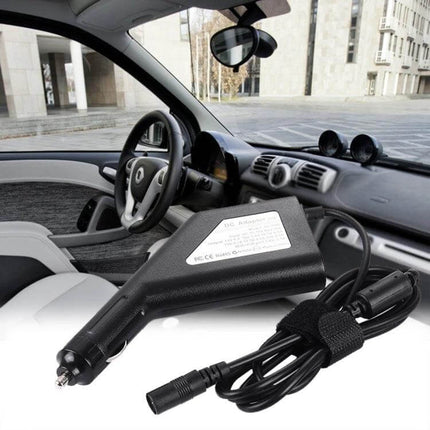 Universal Car Charger for Laptops with Multiple Adapters showing black DC car adapter and cable inside a vehicle