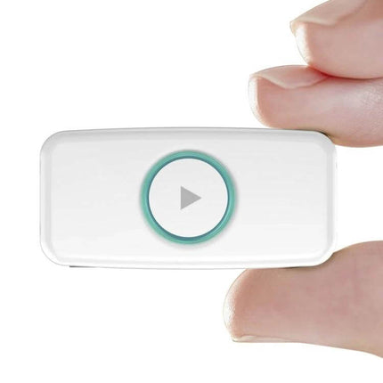 Doosl Mini Car Bluetooth Music Receiver With 3.5mm Stereo Input — compact white Bluetooth 4.0 dongle held between fingers