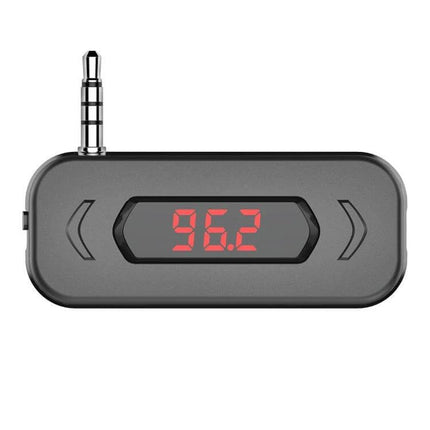 Car FM Transmitter With LCD Display For In Car Music - compact 3.5mm plug transmitter showing 96.2 on red LCD display, PLL stable FM streaming