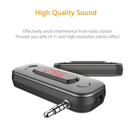 Car FM Transmitter With LCD Display For In Car Music showing compact black 3.5mm plug unit with red LCD frequency readout