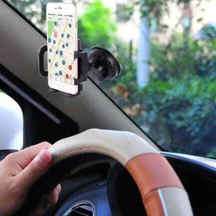 Universal Car Mount with Suction Cup for Smartphones holding phone with navigation on windshield for hands-free driving