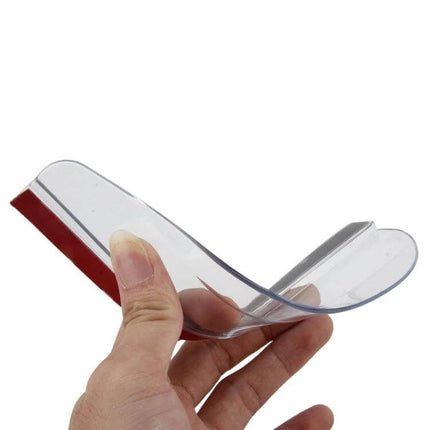 Car Rearview Mirror Rainproof Blades for Safe Driving - clear adhesive rain shield held in hand to protect mirror visibility