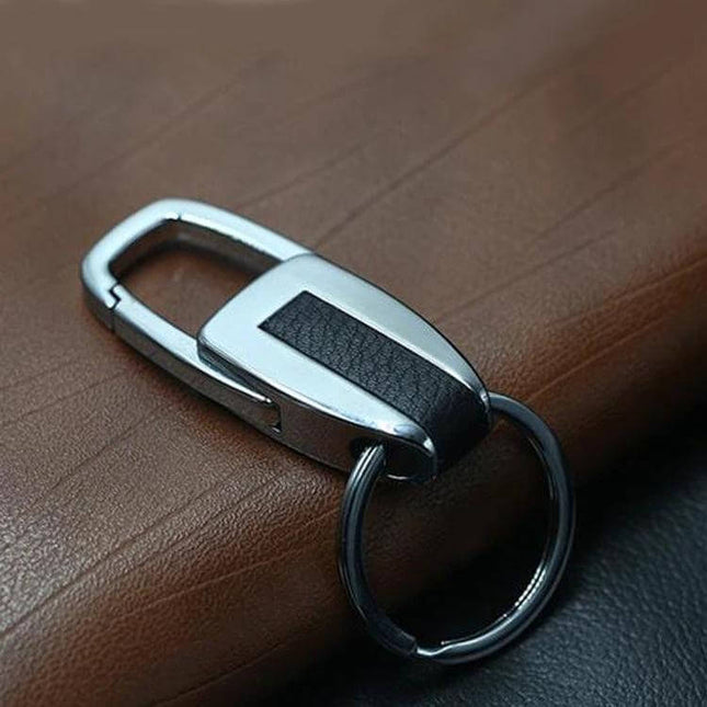 Leather and Metal Single Ring Key Chain for Car Keys on leather surface, durable metal clip and loop for secure key attachment