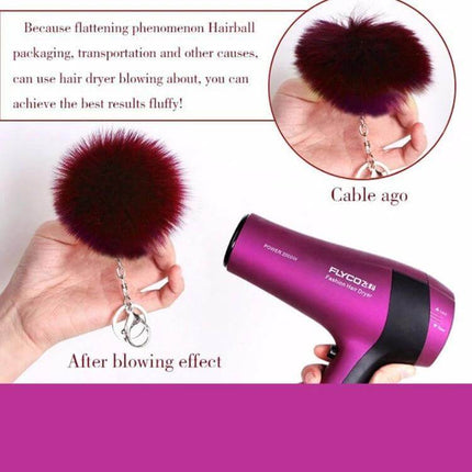 Rex Rabbit Shaped Artificial Fur Keychain for Bags and Keys - burgundy fluffy pompom keychain shown with hairdryer to restore fluff