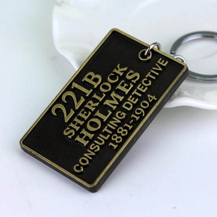 Sherlock Holmes 221B Baker Street Themed Key Chain Holder — antique brass 221B plaque keyring for fans, car keys or bag accessory