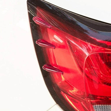 Universal Acrylic Resin Rear Spoiler for Car Protection and Decoration installed on red taillight protecting against bumps and scratches