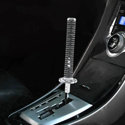 Universal Samurai Shaped Gear Shift Knob, 31.5cm Length mounted in car console for improved grip and custom interior look