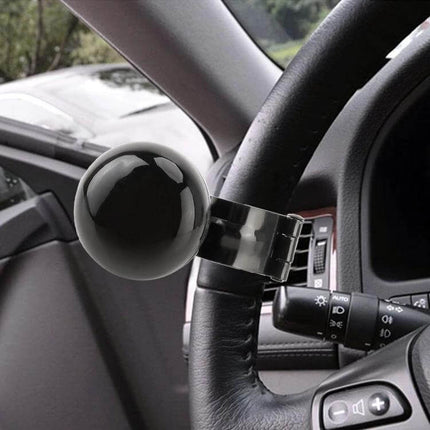 Universal Car Steering Wheel Spinner Knob in Black for Easy Driving Assistance - black metal knob attached to steering wheel for easier turning