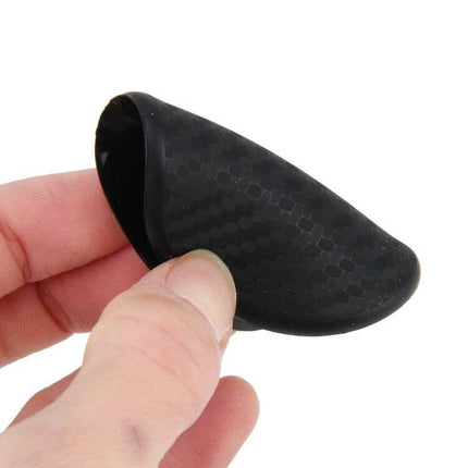 Rubber Cup Holder Mat for Car Phones and GPS Devices, 6.5cm Diameter - black textured rubber insert held between fingers to stabilize devices in cup holders
