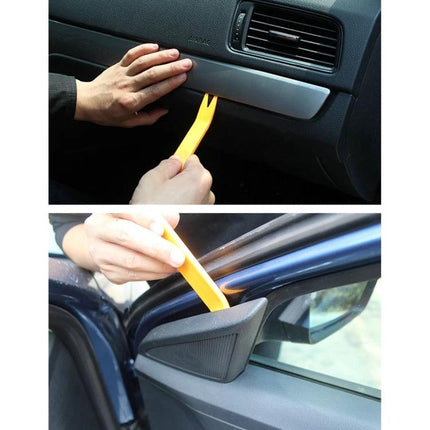 Essential Tool Kit for Home Car Audio System Repairs showing plastic pry tools removing car dashboard panels and trim