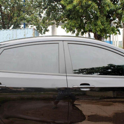 Aumo-Mate Chameleon Window Tint Film for Car Protection installed on black sedan side windows reducing glare and enhancing privacy