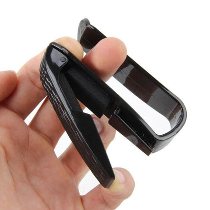 Practical Vehicle Mounted Holder for Sunglasses and Eyeglasses securely clipped in hand for easy car storage and quick access