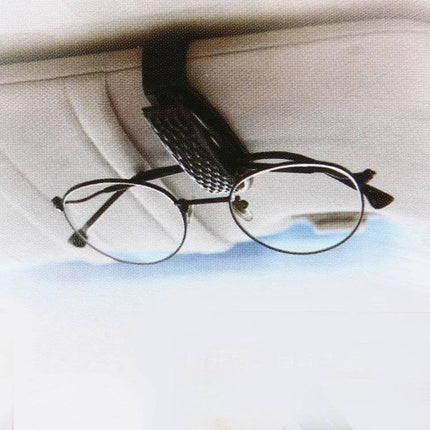 Practical Vehicle Mounted Holder for Sunglasses and Eyeglasses clipped to car visor holding round eyeglasses for easy access