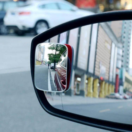 Square Wide Angle Adjustable Blind Spot Mirror for Cars and Trucks, 7x4 cm Size mounted on side mirror showing widened view of car side and blind spot