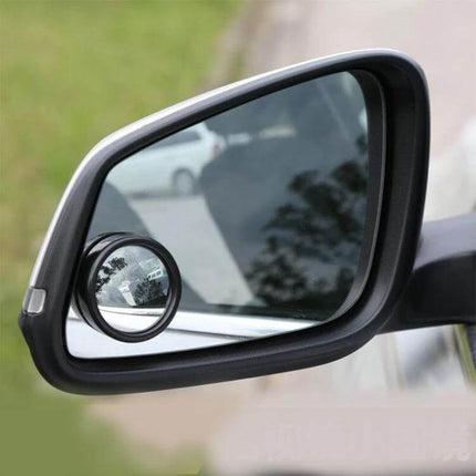 Wide Angle Blind Spot Mirrors for Cars and Trucks, 2 Pack attached to car side mirror showing expanded view of blind spot