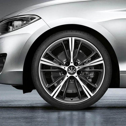 Decorative Silver Leaves Metal Stickers for Car Wheels, 4 Pieces applied on alloy rim showing subtle silver leaf metal decal set