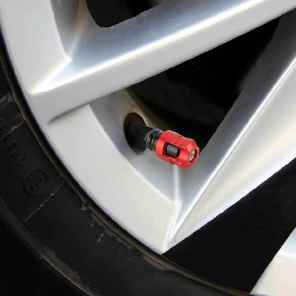 Durable Metal Tire Valve Caps 4 Pack For Cars And Everyday Use red metal valve cap on car wheel close-up, 2.2cm x 1.3cm protective dust-tight seal