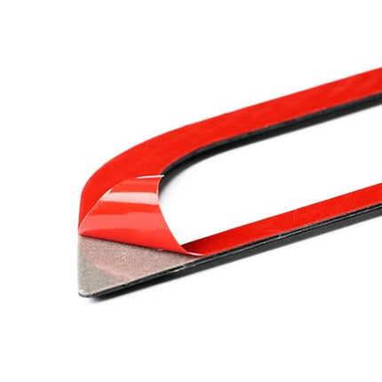 Carbon Fiber Side Air Outlet Sticker for Ford Mustang 2015-2017 - close-up of red-backed adhesive trim piece ready for application