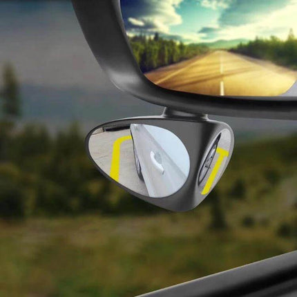 Left Blind Spot Mirror for Cars with Rotatable Design mounted on left mirror showing rear wheel and curb for improved visibility