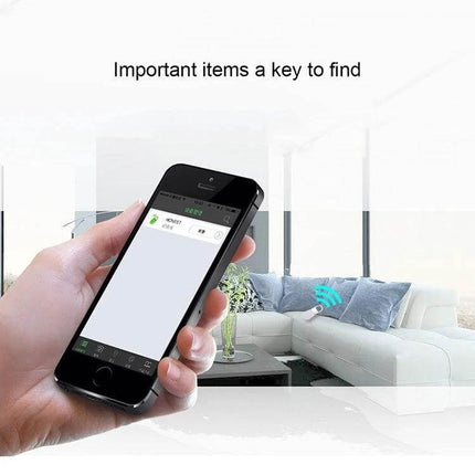 R2 Bluetooth Anti-Lost Tracker for Everyday Items attached to keys tracked via smartphone app in living room