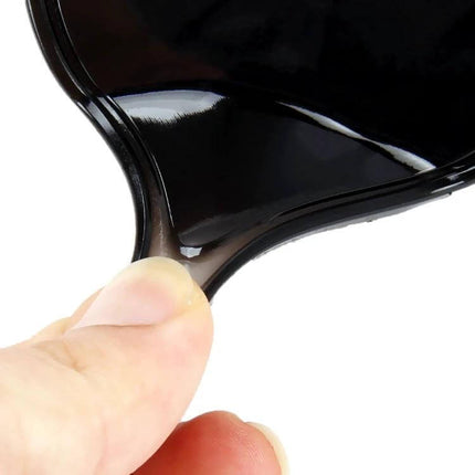 Round Soft Rubber Dashboard Anti-Slip Mat for Phones and GPS – close-up of flexible soft rubber being stretched by fingers to show grip
