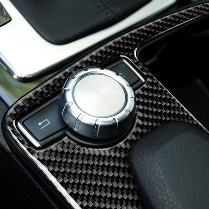 Carbon Fiber Decorative Sticker for Mercedes-Benz Left Drive Gear Panel installed around center control knob, glossy carbon fiber pattern enhancing interior
