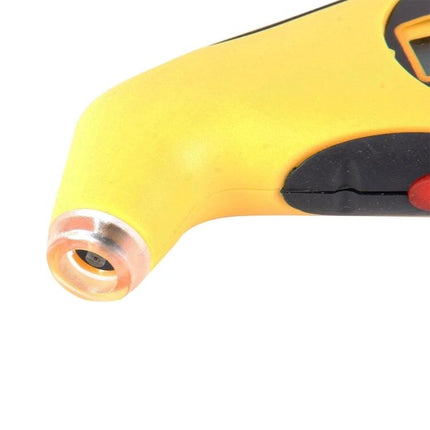 Cedar Digital Gauge for Checking Tire Pressure on Daily Drives - close-up of yellow digital tire pressure gauge nozzle and valve connector