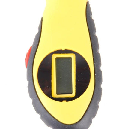 Cedar Digital Gauge for Checking Tire Pressure on Daily Drives - close-up of yellow digital tire pressure gauge display
