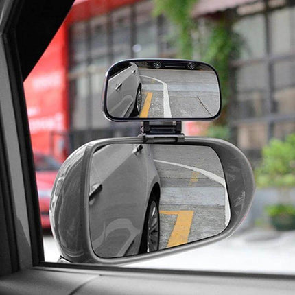 Rotatable Blind Spot Assistant Mirror for Vehicle Visibility attached to lower left of car side mirror showing expanded blind spot view