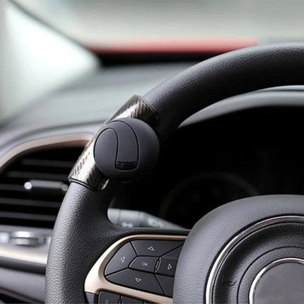 Universal Car Steering Wheel Spinner Knob for Easy Driving mounted on leather steering wheel for improved control during parking and tight turns