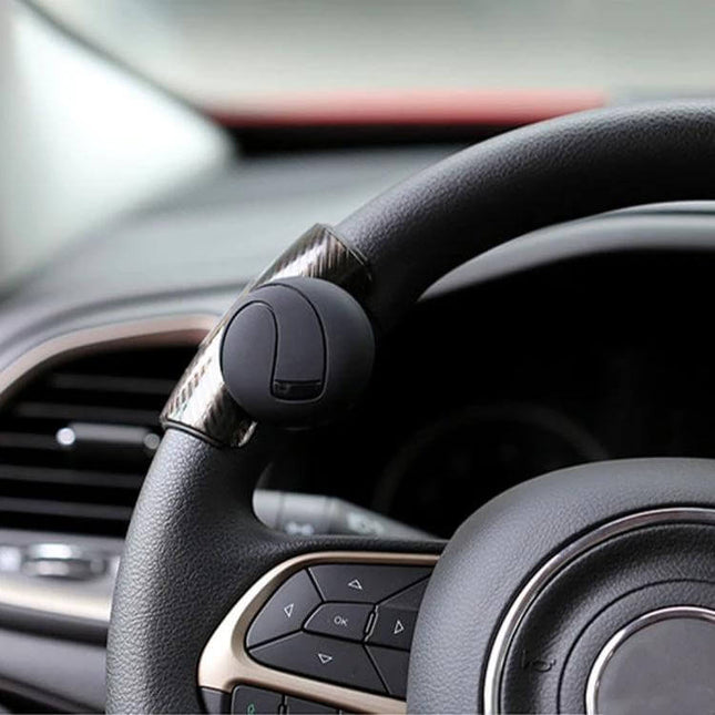 Universal Car Steering Wheel Spinner Knob for Easy Driving mounted on leather steering wheel for improved control during parking and tight turns