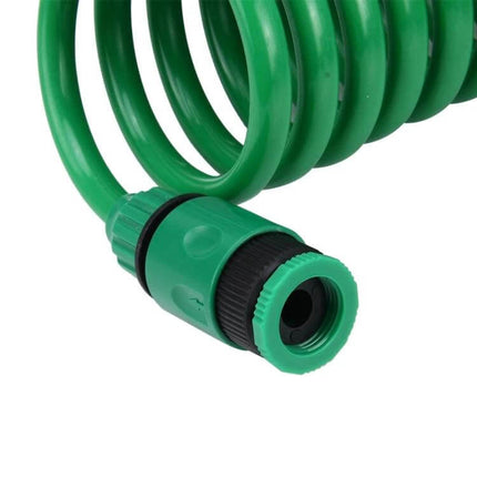 Garden Watering Telescopic Hose 30m With Connector green spiral hose with connector close-up showing coil and fitting