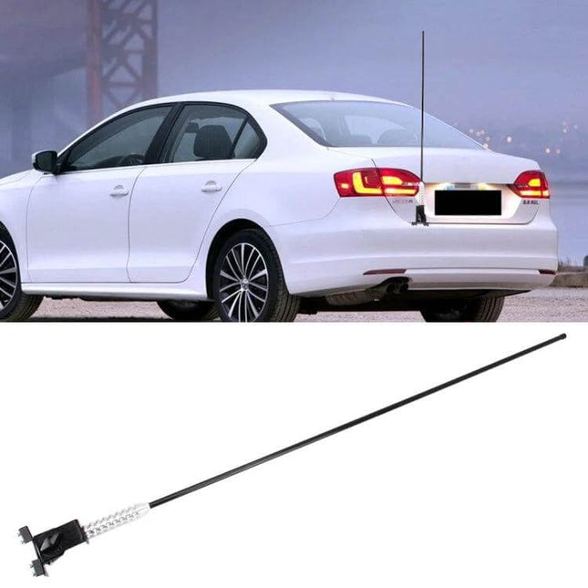 105cm Long Car Antenna Aerial for Radio Reception mounted on rear of white sedan to improve AM/FM signal