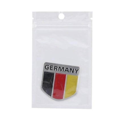 Germany Flag Style Metal Car Sticker for Vehicle Protection on clear packaging showing black red yellow shield badge