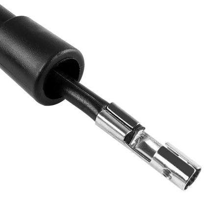Compact Device for Checking Spark Plugs in Daily Car Maintenance handheld tester probe close-up on connector