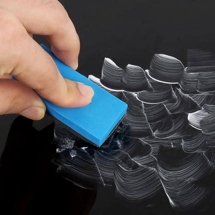 Polishing Abrasive for Car Scratch Repair and Maintenance being applied with a blue block to remove minor paint surface scratches during routine care
