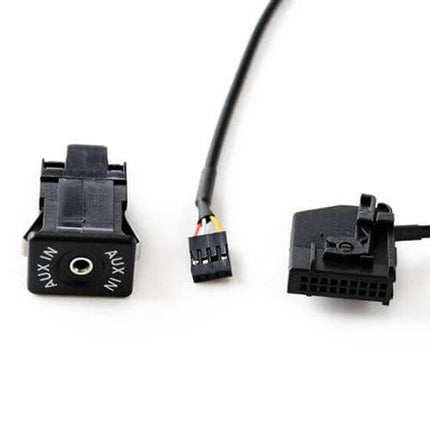 Auxiliary Adapter Plug And Wiring For Volkswagen Audi Ford Cars - black AUX input module with wiring harness and factory connector
