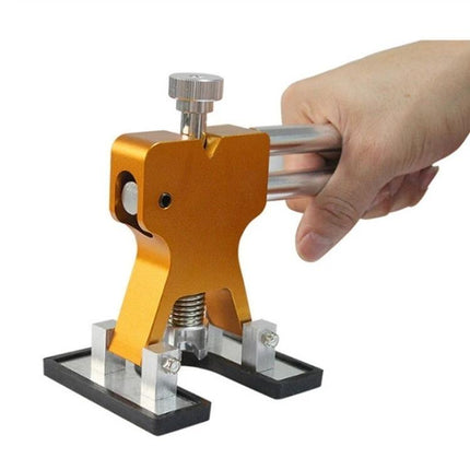 A Versatile Kit for Everyday Car Dent Repairs gold dent puller tool handheld for DIY driveway dent removal
